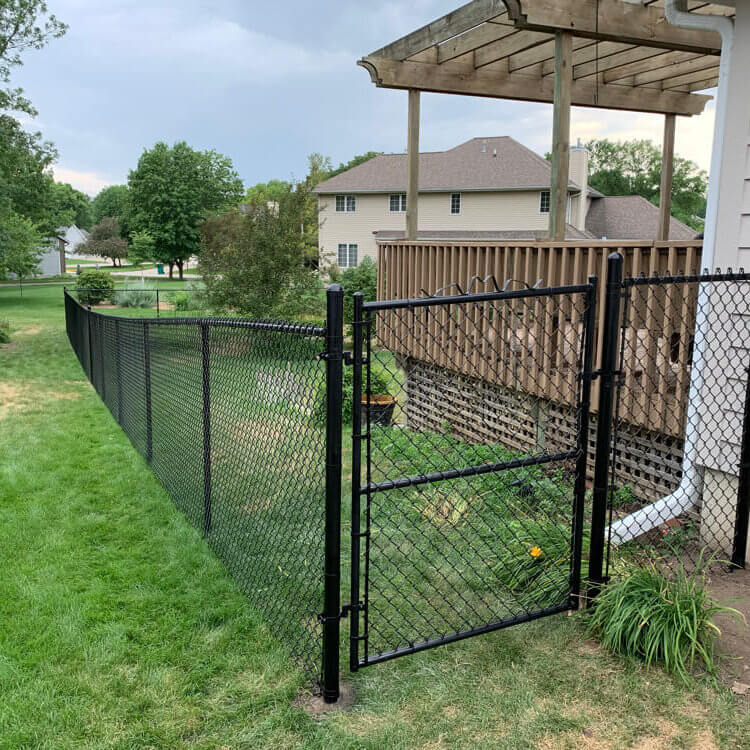 Residential black vinyl-coated chain-link fence