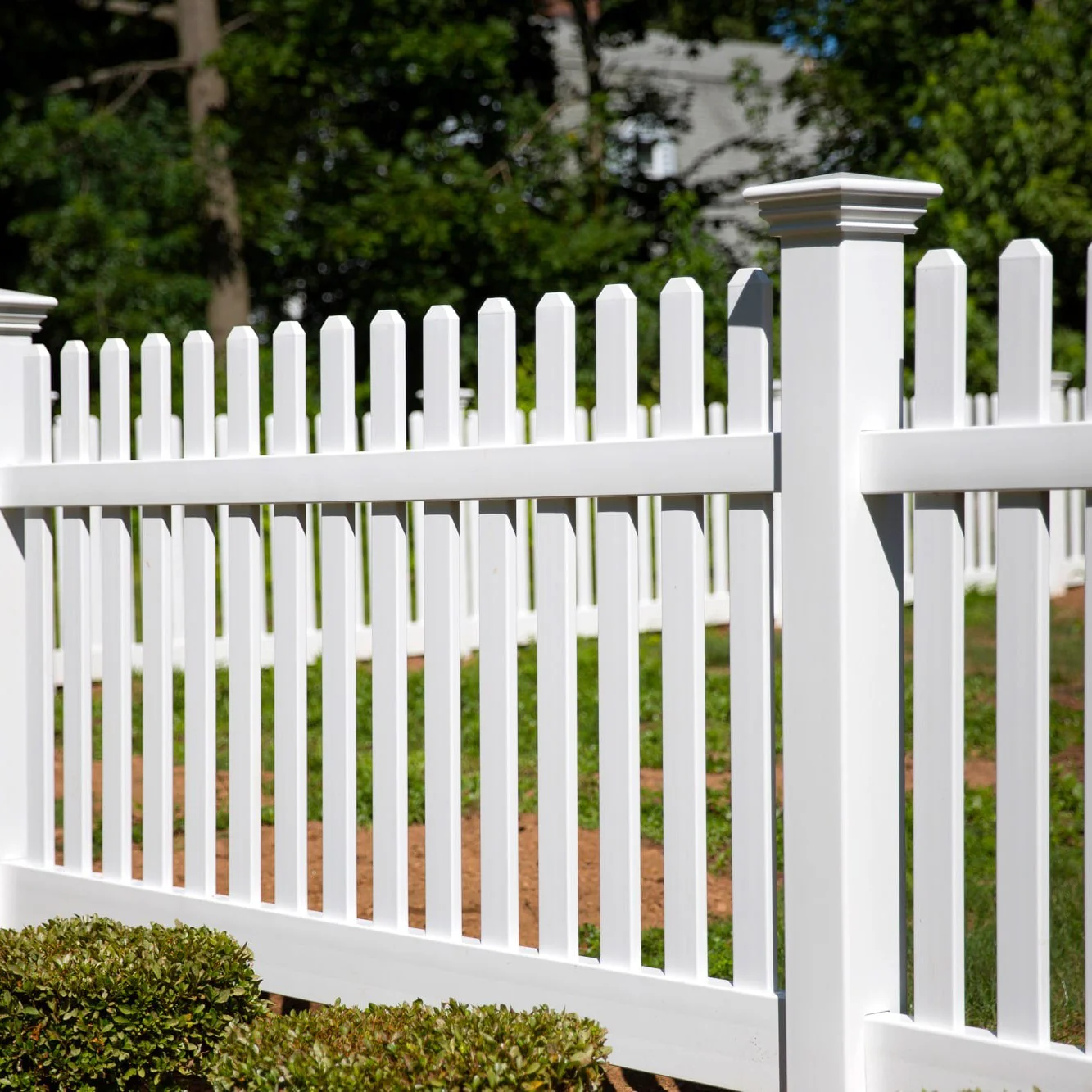 White vinyl picket fence