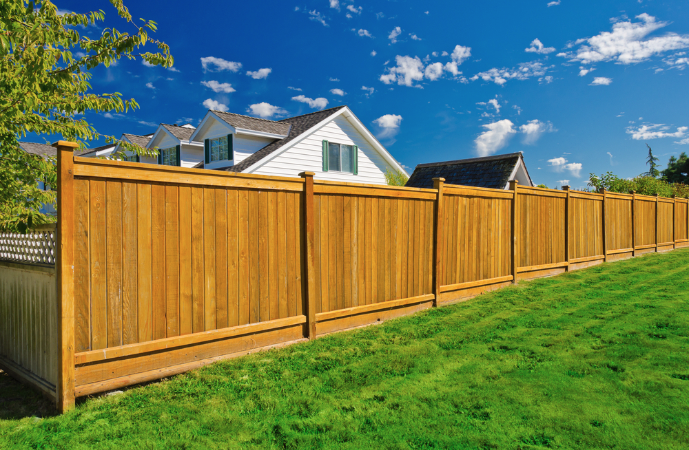 Cedar privacy fence with top cap